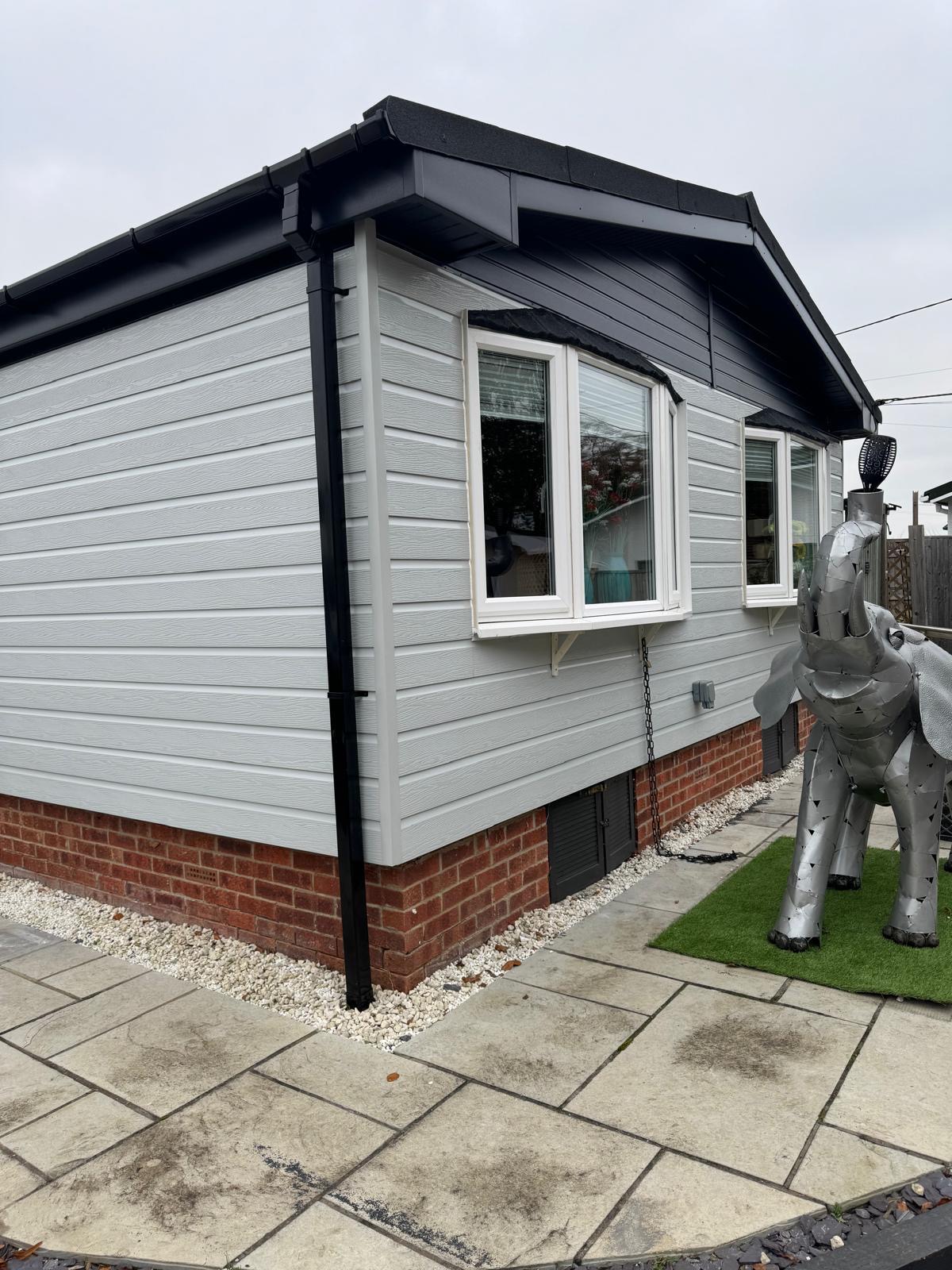 Beautifully renovated park home with fresh grey and white cladding